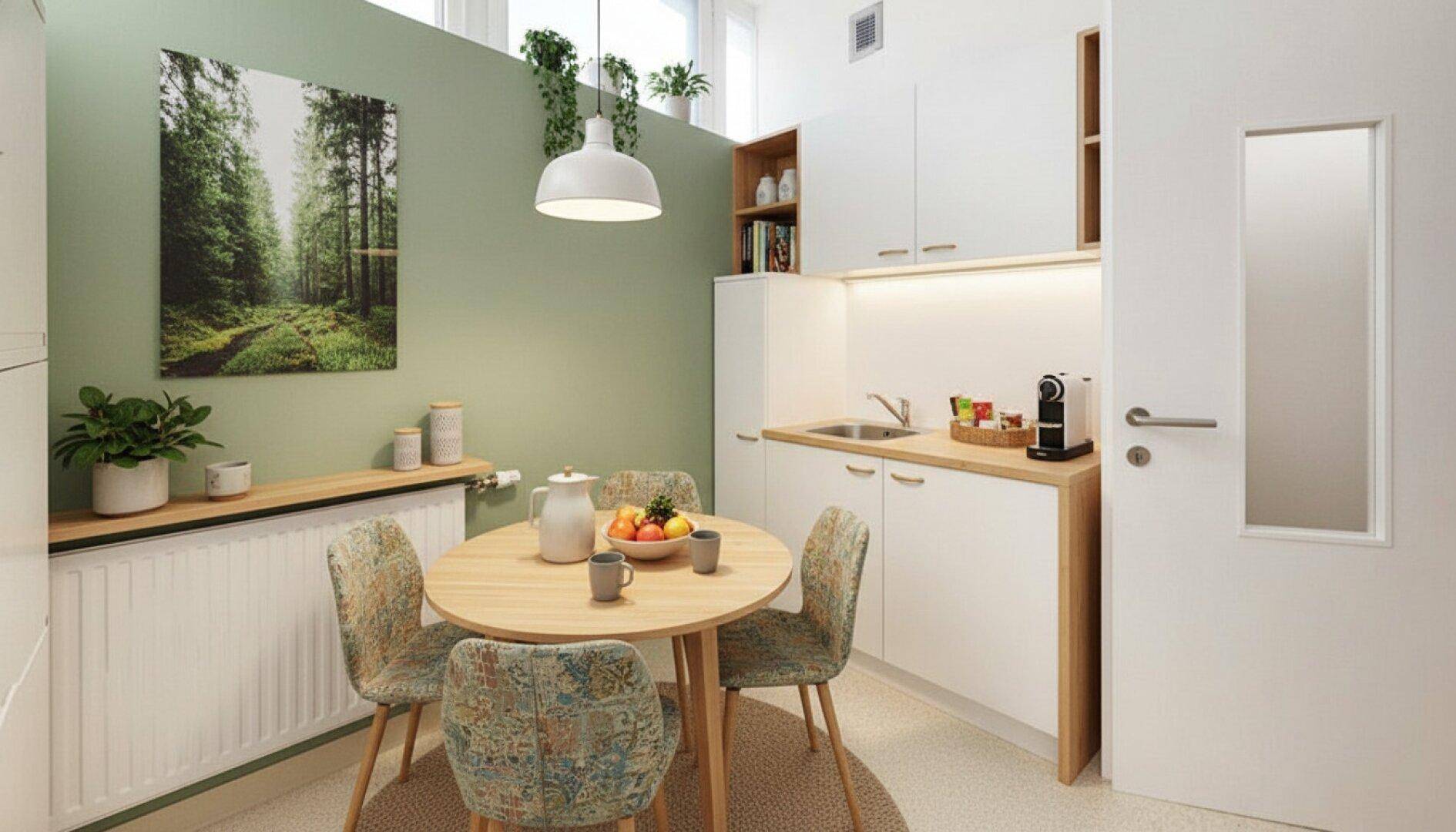 Gemütliche Küchenzeile mit Essbereich, Holztheke und grüner Akzentwand.