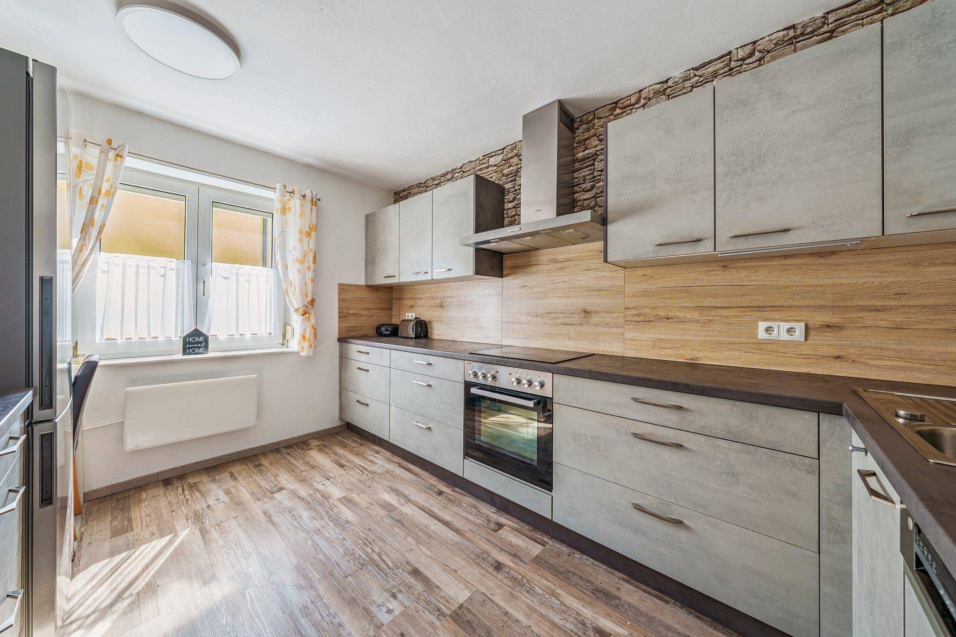 GEPFLEGTES ZWEIFAMILIENHAUS IN BÜRMOOS - Ansicht 3