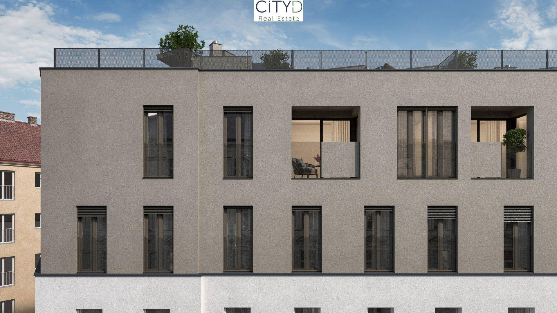Nahaufnahme der oberen Etagen eines modernen Gebäudes mit großen Fenstern und Balkonen.