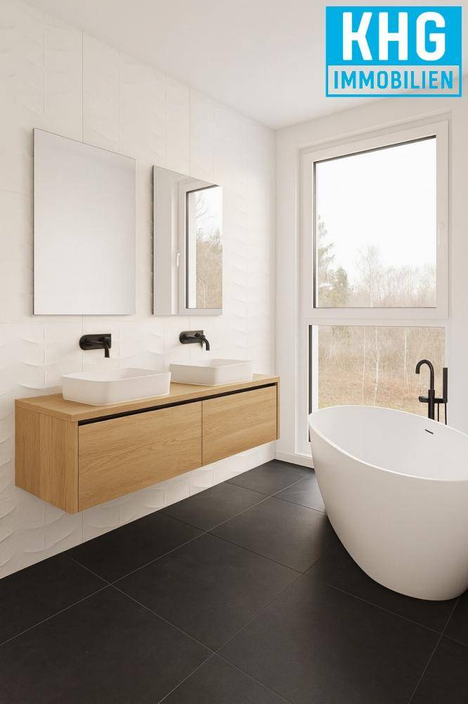 Elegantes Badezimmer mit freistehender Badewanne, Doppelwaschbecken und dunklem Fliesenboden.