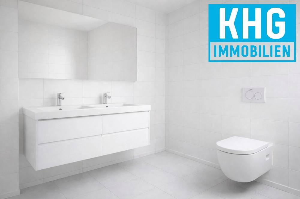 Modernes Badezimmer mit Doppelwaschbecken, wandhängendem WC und weißen Fliesen.