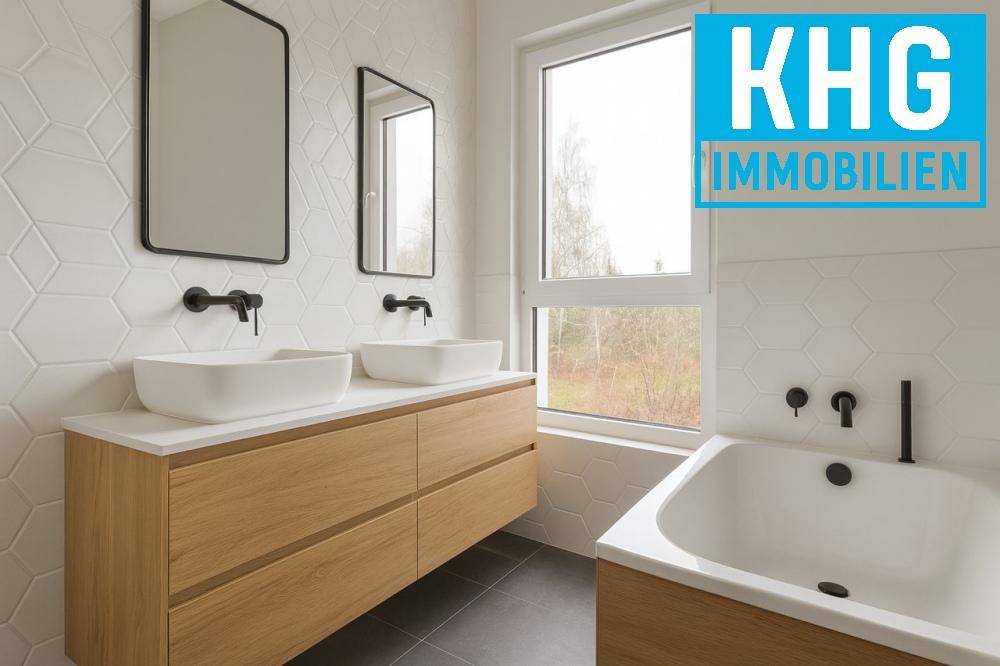 Modernes Badezimmer mit Doppelwaschbecken, Badewanne und großem Fenster für viel Tageslicht.