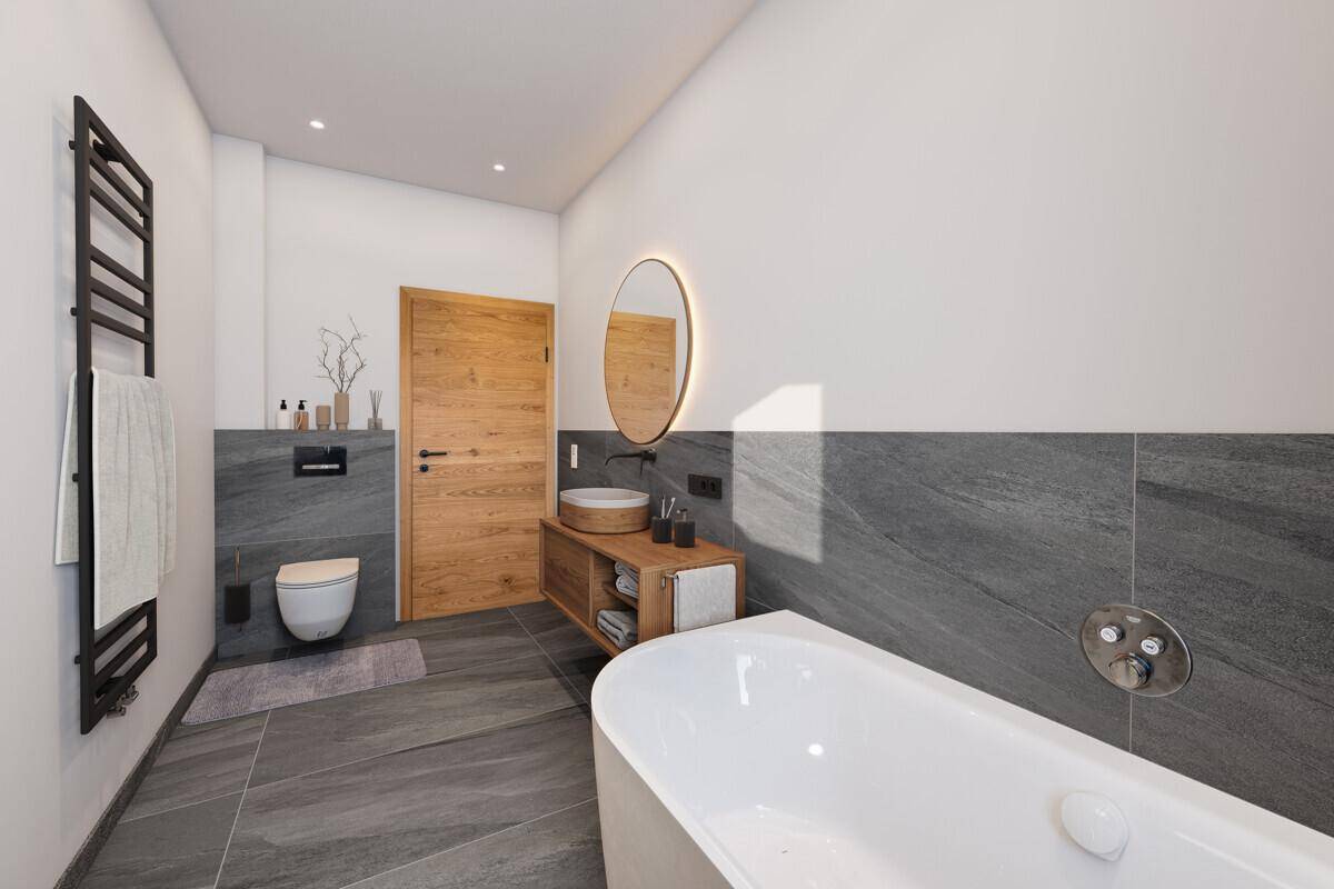 Elegantes Badezimmer mit freistehender Badewanne, Holzwaschtisch und Wand-WC.
