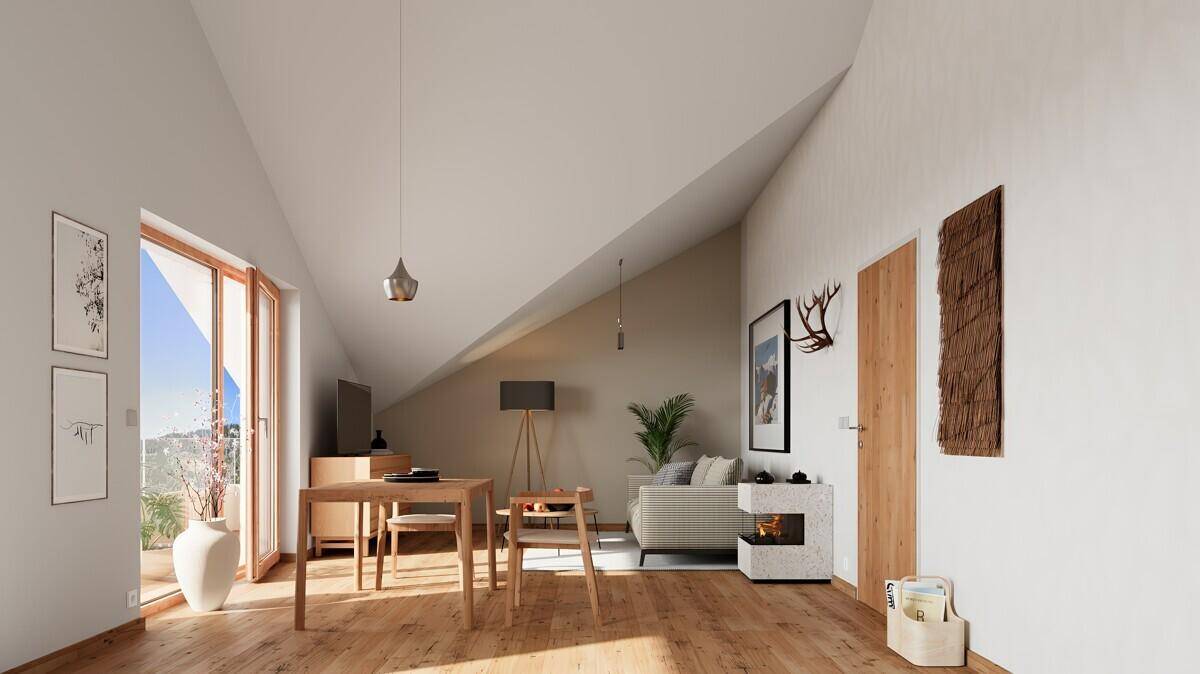 Heller Wohn- und Essbereich mit Holzboden, Dachschräge und modernem Kamin in alpiner Umgebung.