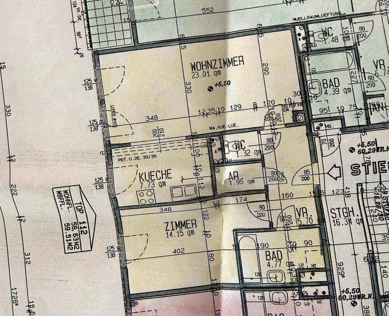 Grundriss einer 58,63 m² großen Wohnung mit Wohnzimmer, separater Küche, Schlafzimmer, zwei Bädern und Gäste-WC.
