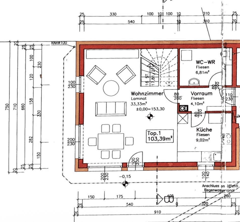 Grundriss des Erdgeschosses mit Wohnzimmer, Küche und separatem WC.