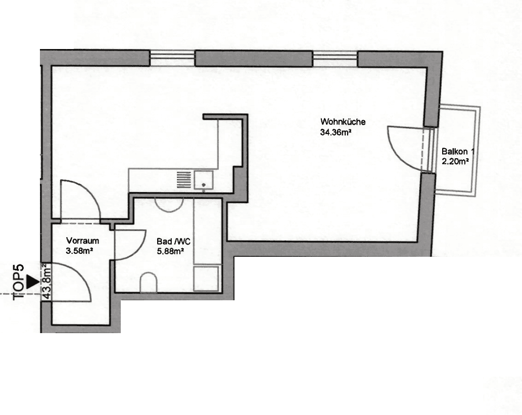 Grundriss einer Wohnung mit Wohnküche, Bad/WC und Balkon.