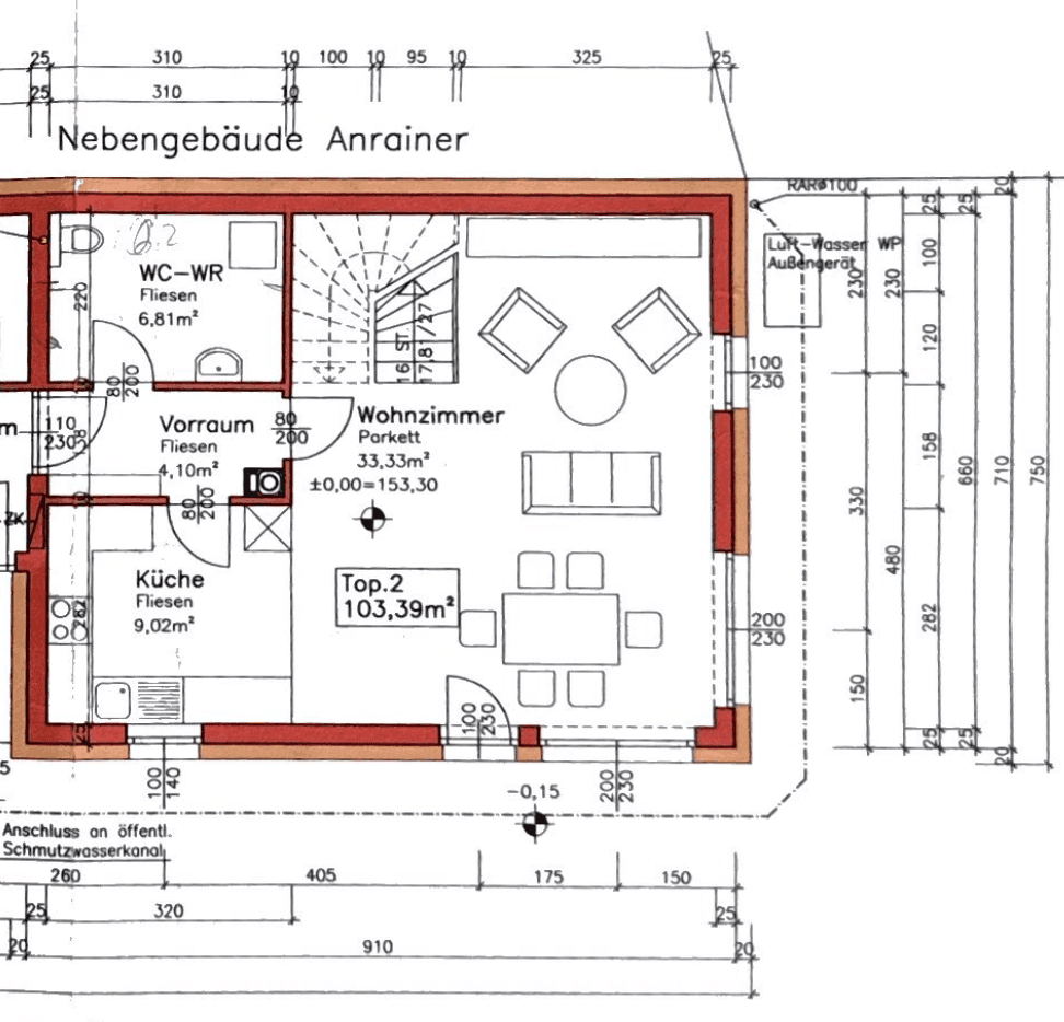 Grundriss des Erdgeschosses mit Wohnzimmer, Küche und separatem WC.