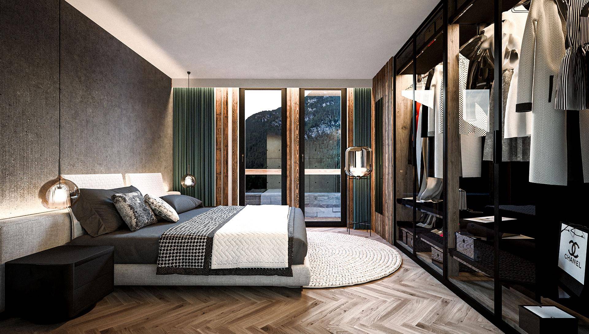 Elegantes Schlafzimmer mit Holzboden, integriertem Kleiderschrank und Zugang zur Terrasse.