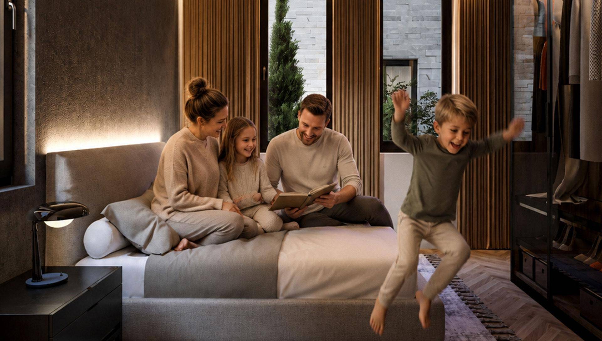 Gemütliches Schlafzimmer mit Familie auf dem Bett, modern eingerichtet und gut beleuchtet.
