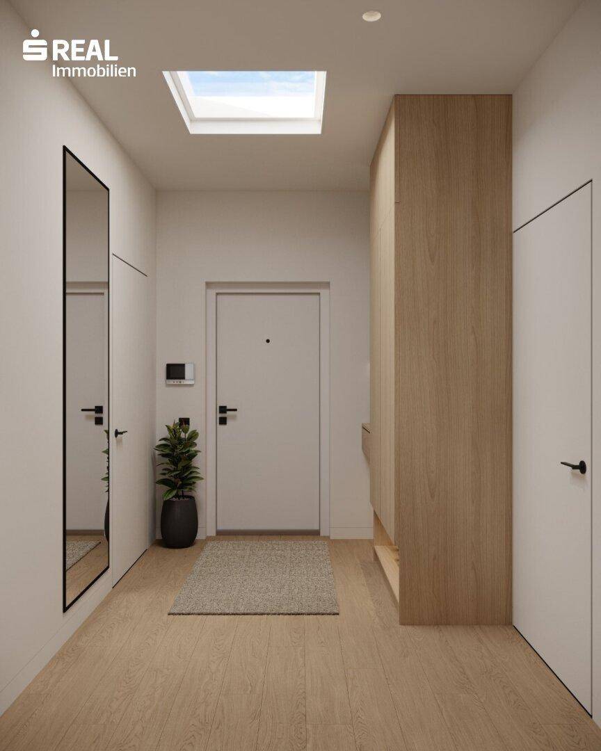 Heller Eingangsbereich mit Holzschrank, großem Spiegel und Oberlicht für natürliches Licht.