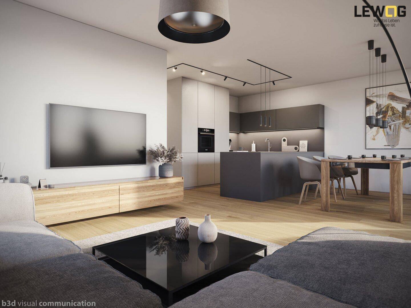 Heller offener Wohnbereich mit integrierter Küche, modernem Sofa und Holzboden.