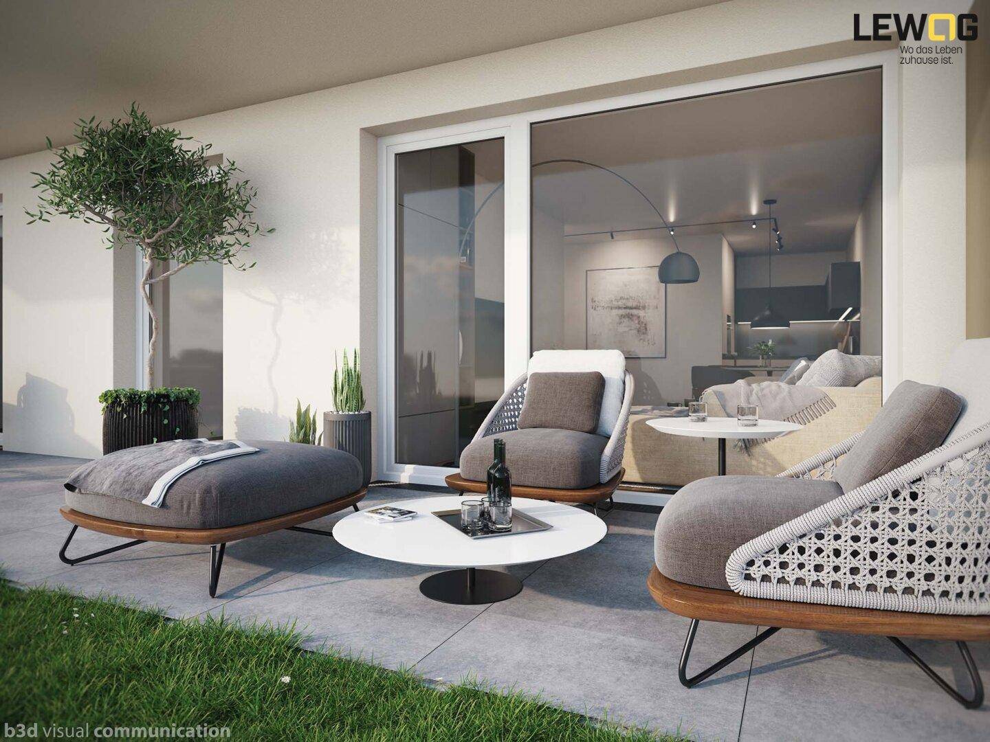 Gemütliche Terrasse mit modernen Loungemöbeln und Blick in den Wohnbereich.