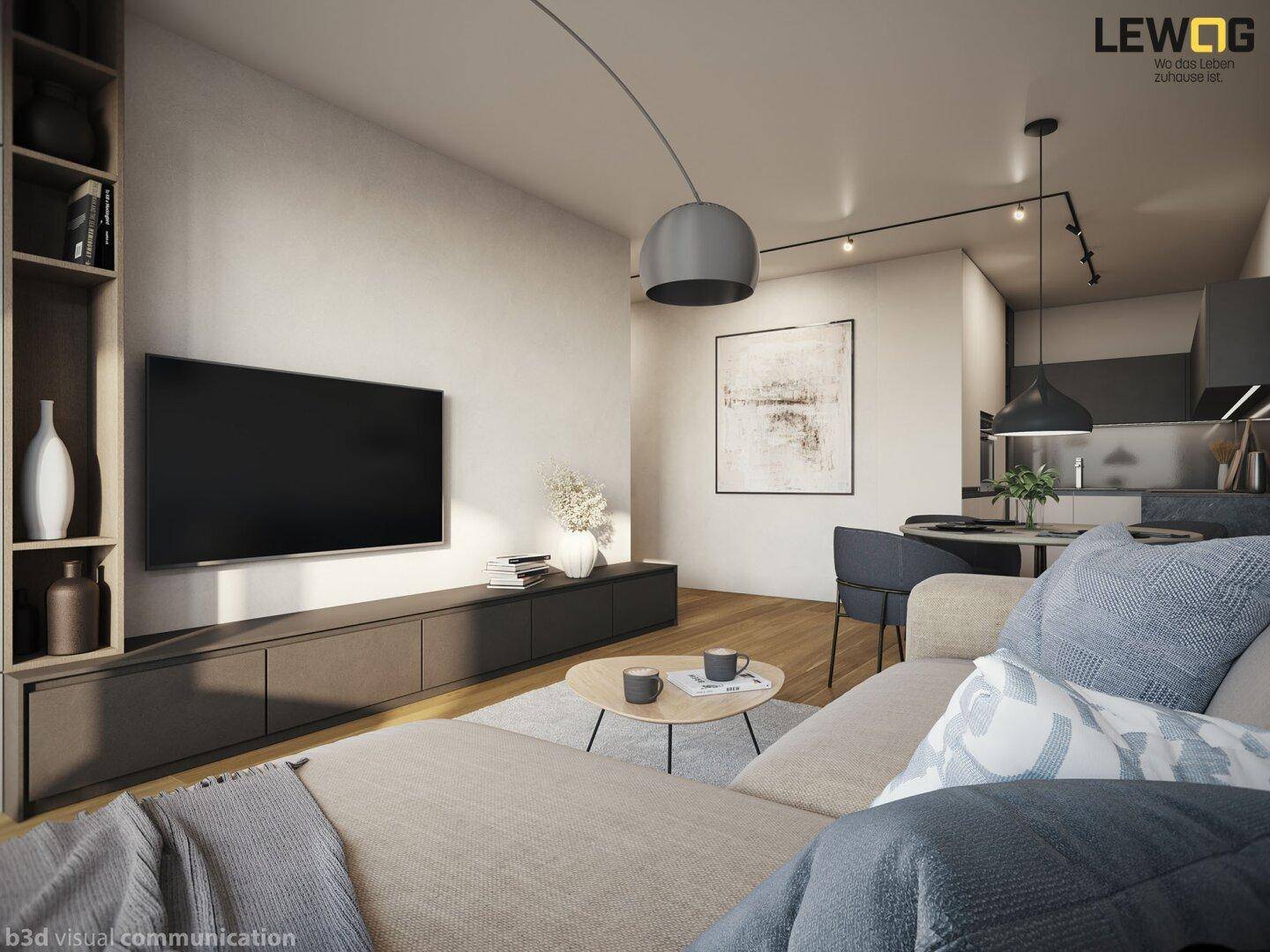 Heller Wohnbereich mit bequemer Couch, Fernseher und Blick auf den Essbereich.