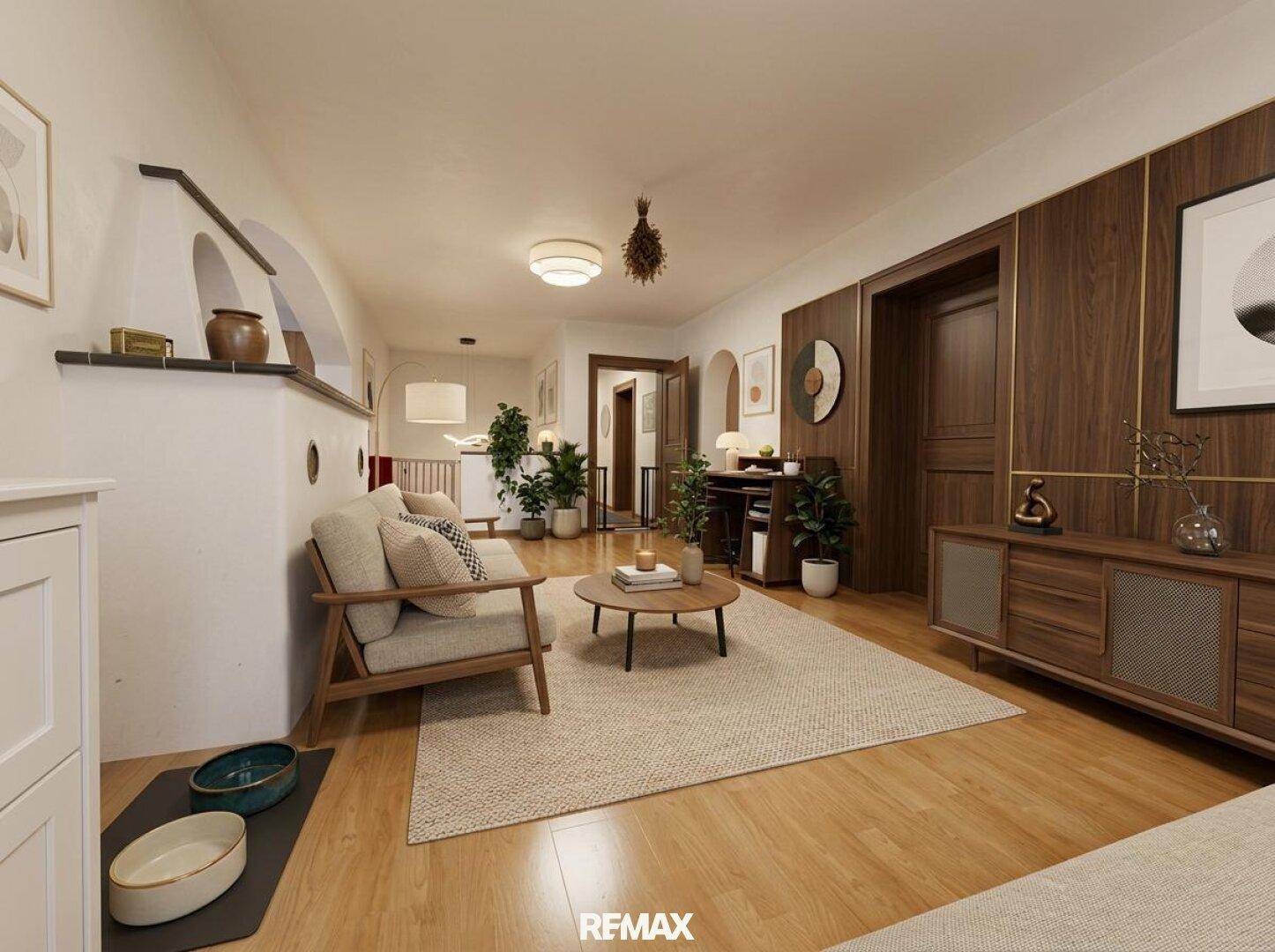Modern eingerichtetes Wohnzimmer mit Holzboden und stilvollen Möbeln, hell und einladend.