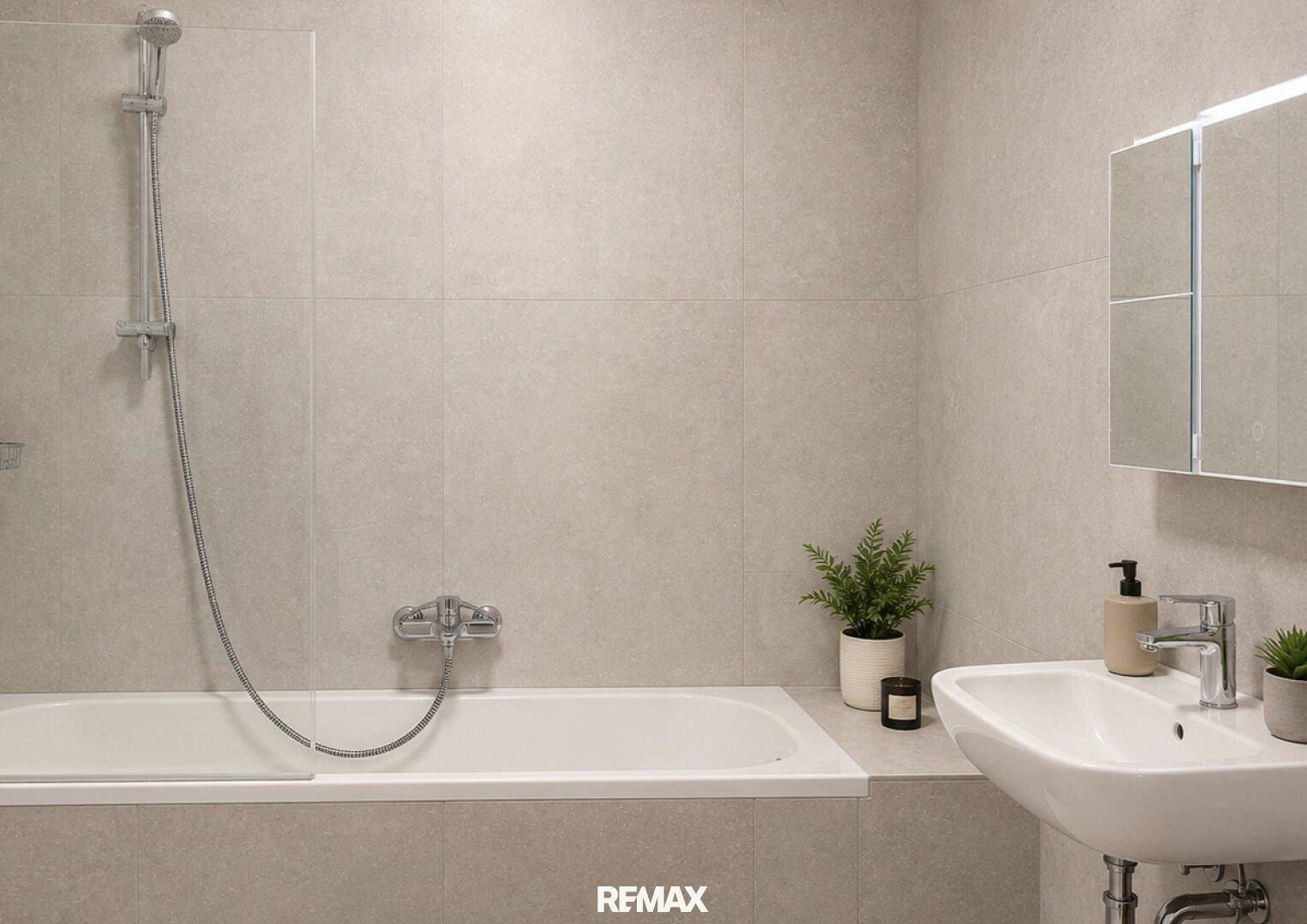 Modernes Badezimmer mit Badewanne, Duschfunktion, Waschbecken und Spiegelschrank.