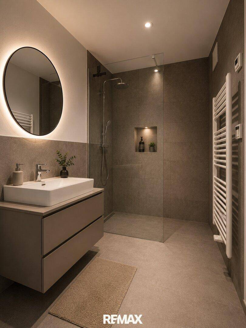 Modernes Badezimmer mit ebenerdiger Dusche, stilvollem Waschtisch und beheiztem Handtuchhalter.