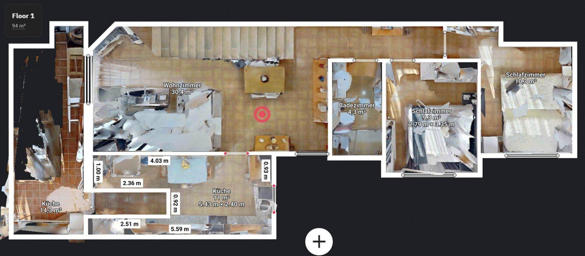 Grundriss des ersten Stocks mit offenem Wohnbereich, Küche und Schlafzimmern.