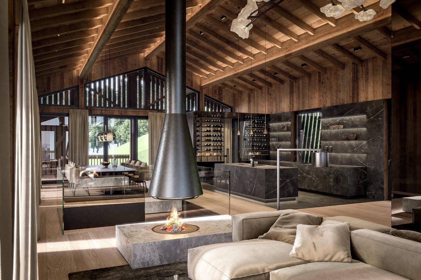 Großzügiger offener Wohnbereich im Chalet-Stil mit Kamin, Holzbalkendecke und integrierter Küche.