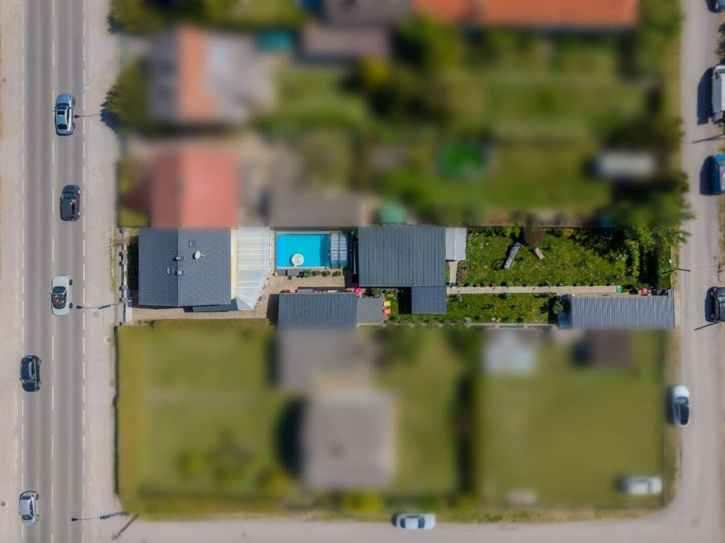 + EINFAMILIENHAUS / Grenze Deutsch Wagram + Grundstück 774m² + BEHEIZTER POOL MIT ÜBERDACHUNG + GARAGE + CARPORT + NÄHE S-BAHN + - Ansicht 4