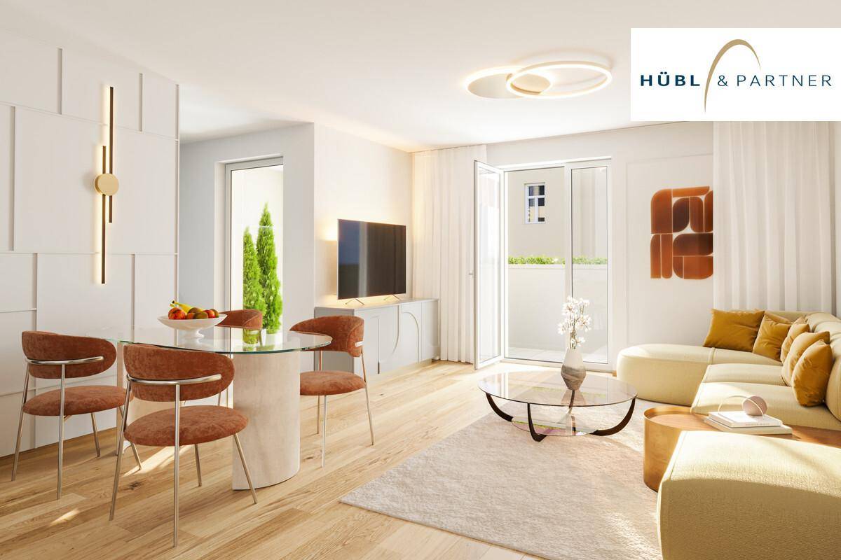 Heller, offener Wohn-Essbereich mit modernem Design, Holzboden und Zugang zum Balkon.