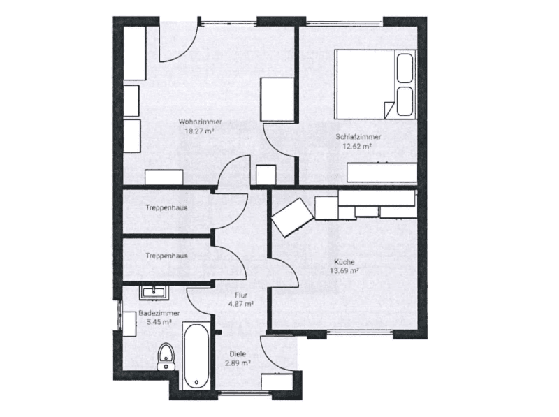 Grundriss des Erdgeschosses mit Wohnzimmer, Schlafzimmer, Küche und Bad.