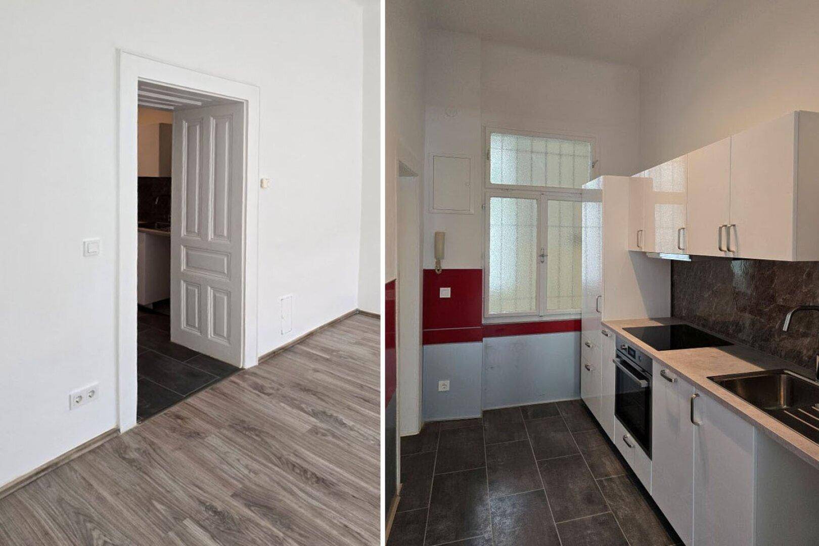Moderne Küche mit weißen Schränken, dunkler Arbeitsplatte und Fenster, teilweise mit roten Akzenten.