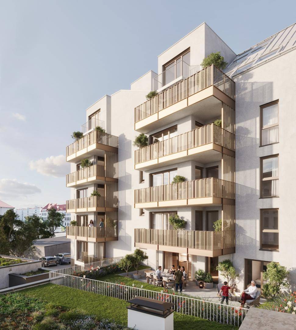 Moderne Wohnanlage mit großzügigen Balkonen und einer belebten Terrasse im Erdgeschoss.