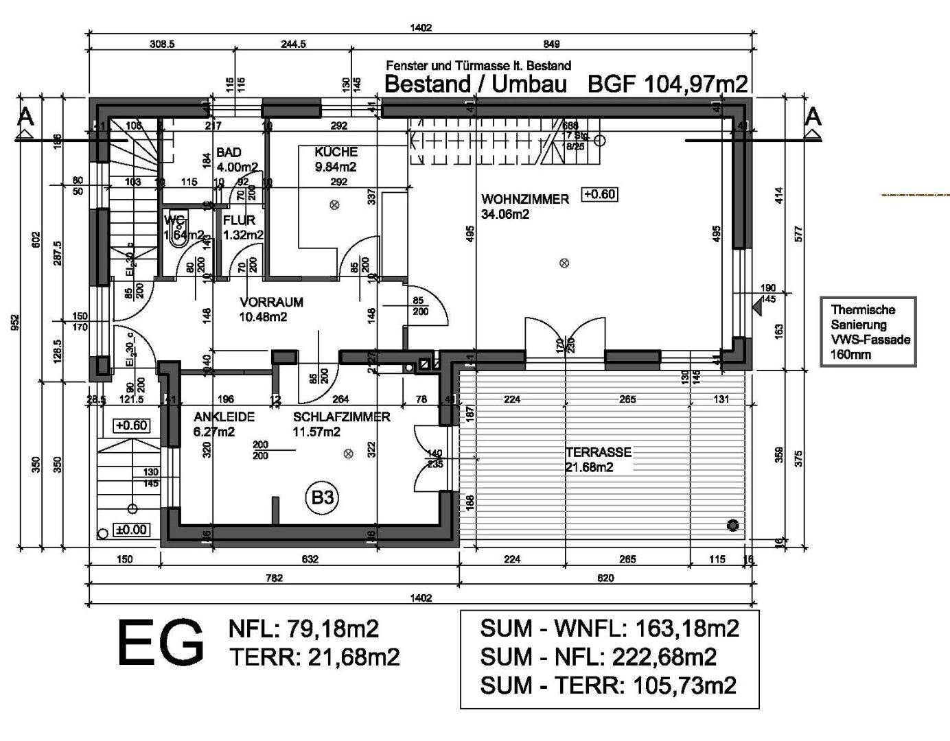 Grundriss des Erdgeschosses mit Wohnzimmer, Küche, Schlafzimmer und Terrasse.