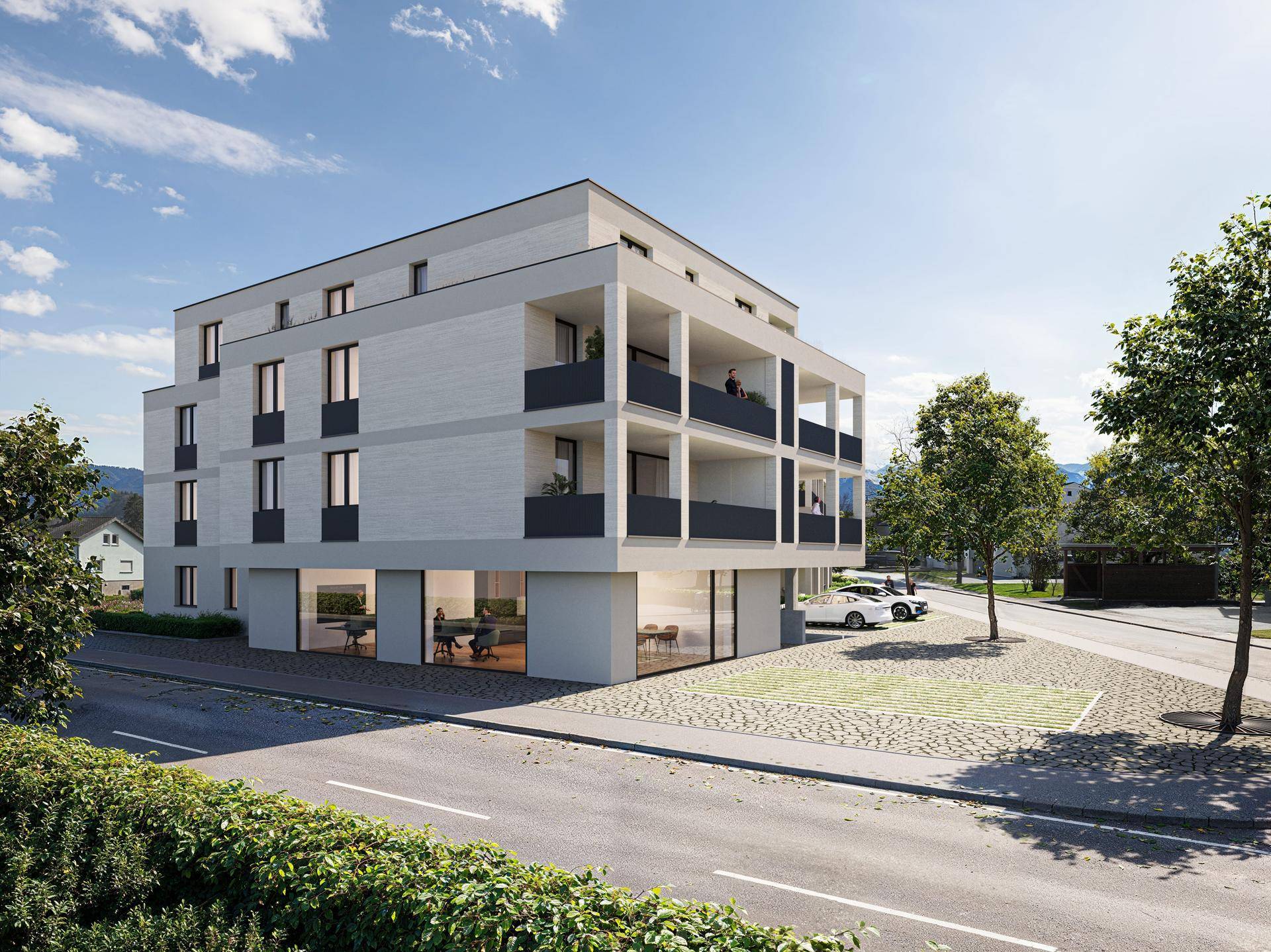 Moderne Architektur eines Mehrfamilienhauses mit Balkonen und großen Fenstern im Erdgeschoss.