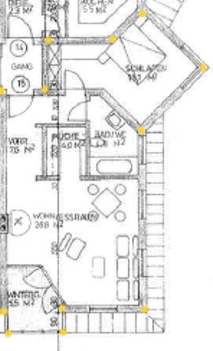 Grundrissplan einer Wohnung mit Wohn-Essbereich, Küche, Bad und Schlafzimmer.