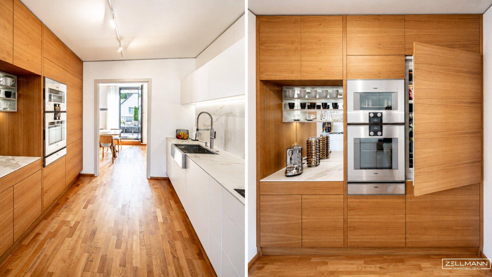 Moderne Küche mit Holzelementen, weißen Arbeitsplatten und integrierten Premium-Geräten.