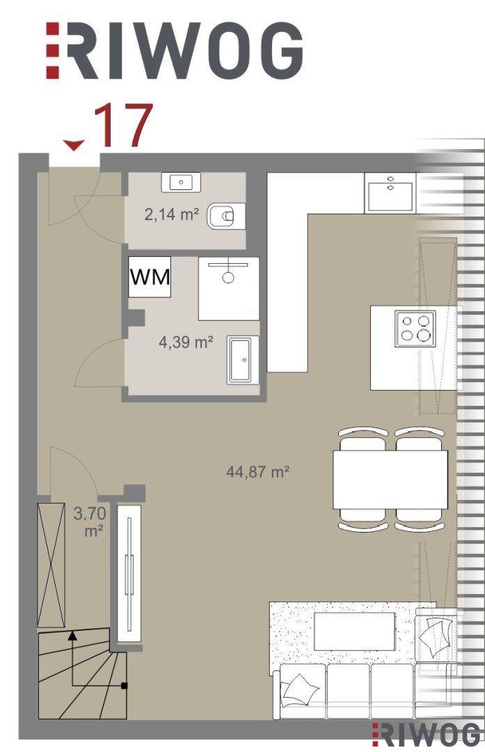 Grundriss der unteren Ebene mit offenem Wohnbereich, Küche, separatem WC und Treppenaufgang.