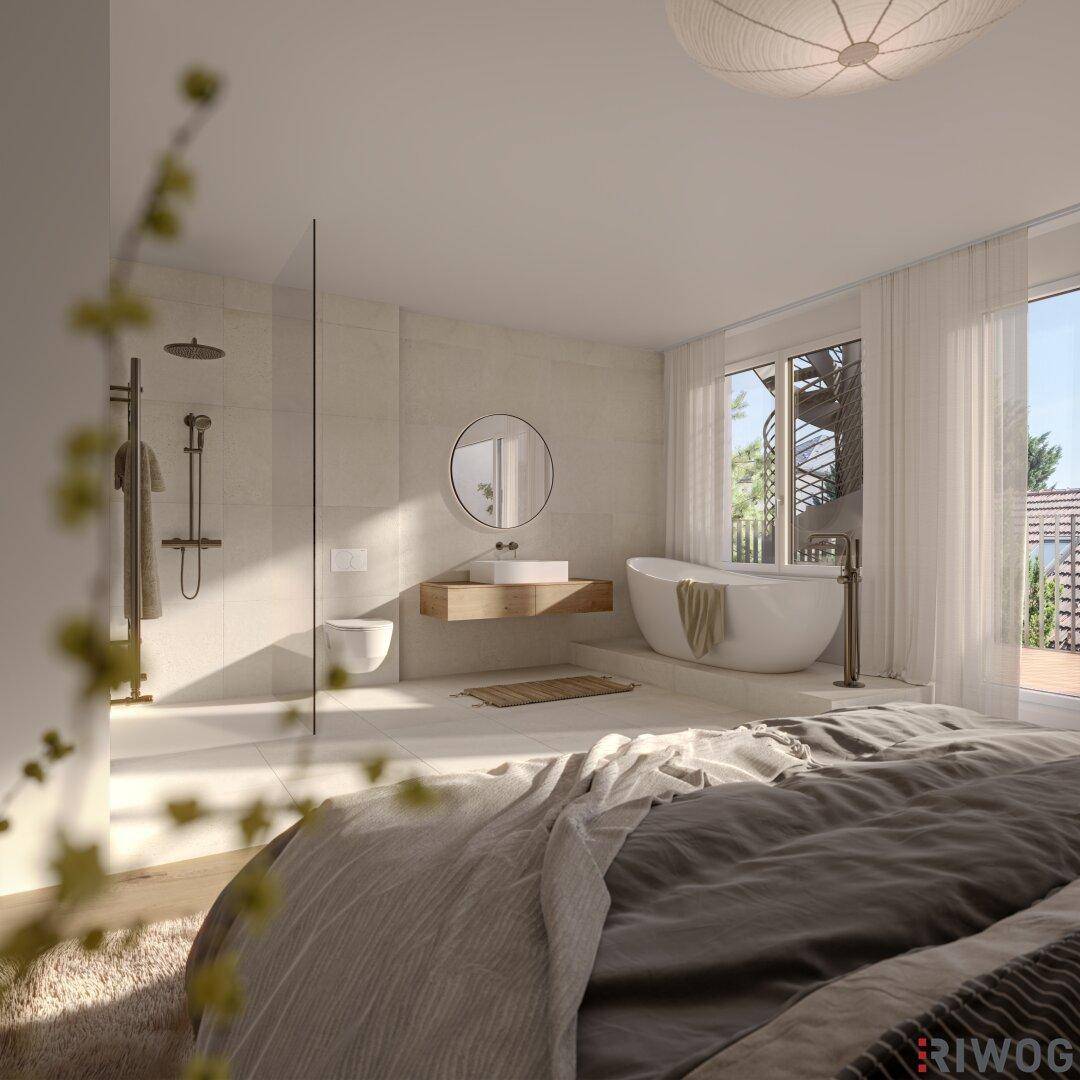 Modernes Badezimmer mit freistehender Badewanne, begehbarer Dusche und direktem Zugang vom Schlafzimmer.