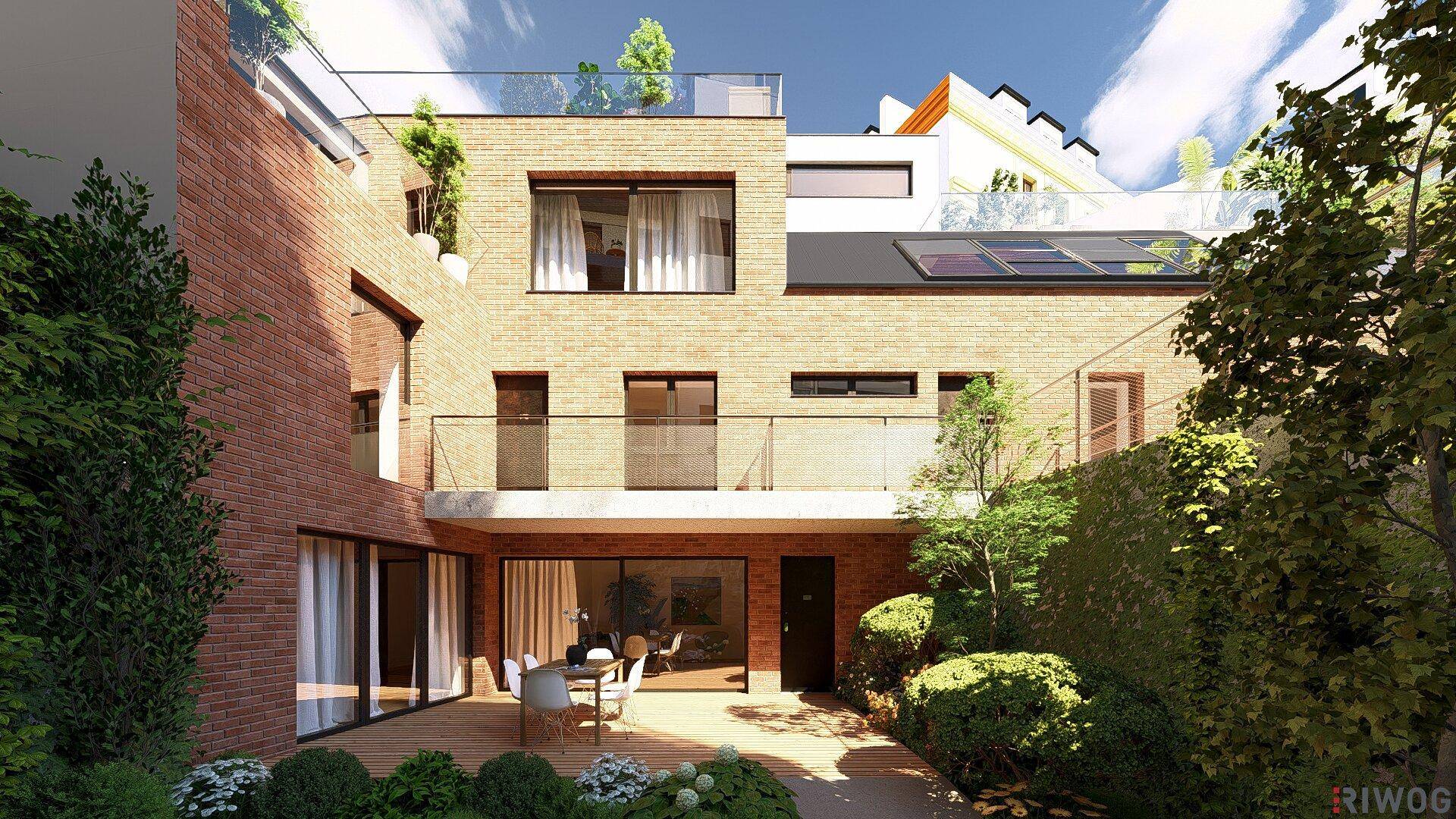 Attraktiver Gartenbereich mit Holzterrasse, Essplatz im Freien und üppiger Bepflanzung an der Gebäudeseite.