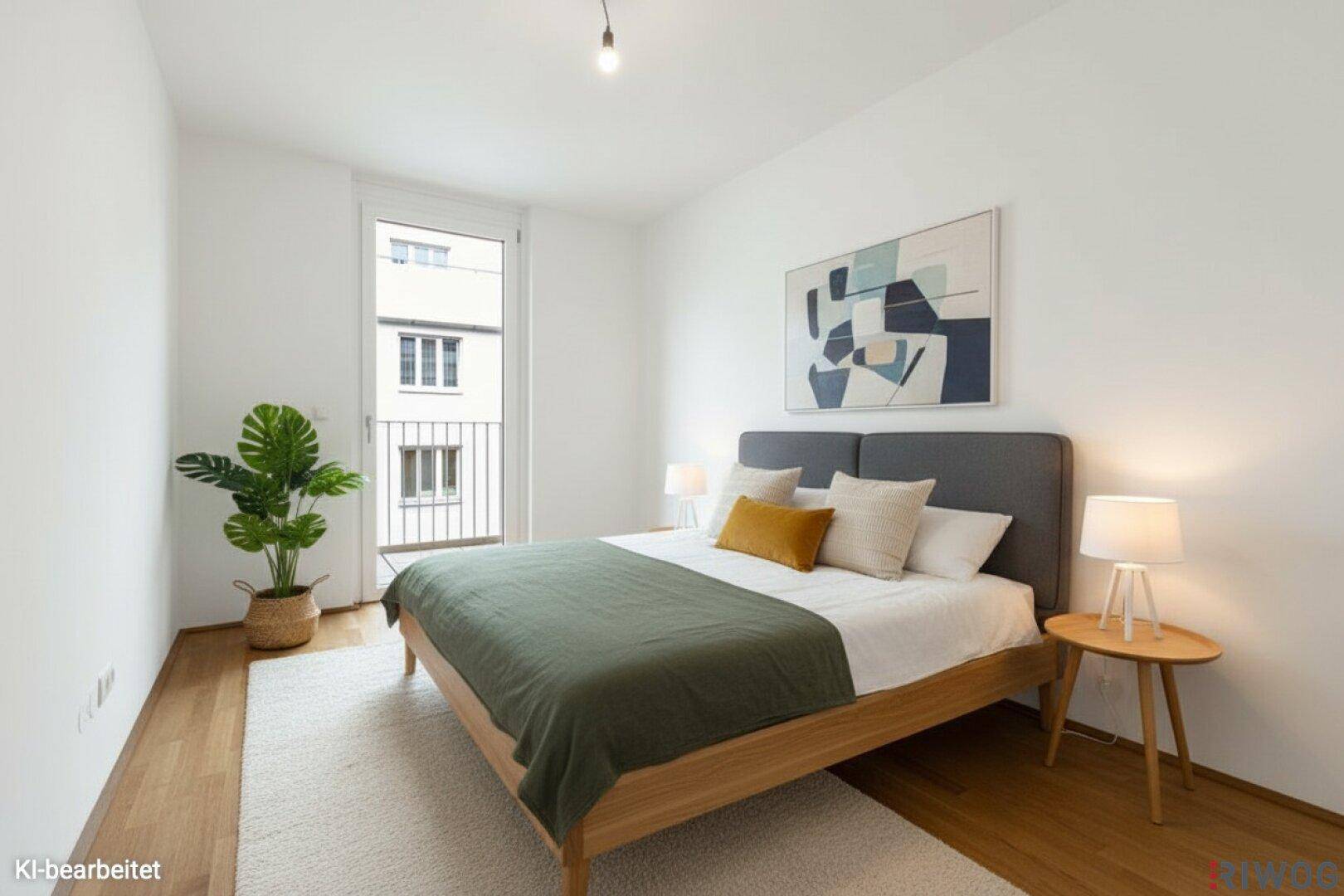 Modern eingerichtetes Schlafzimmer mit Parkettboden und französischem Balkon, bietet viel Tageslicht.