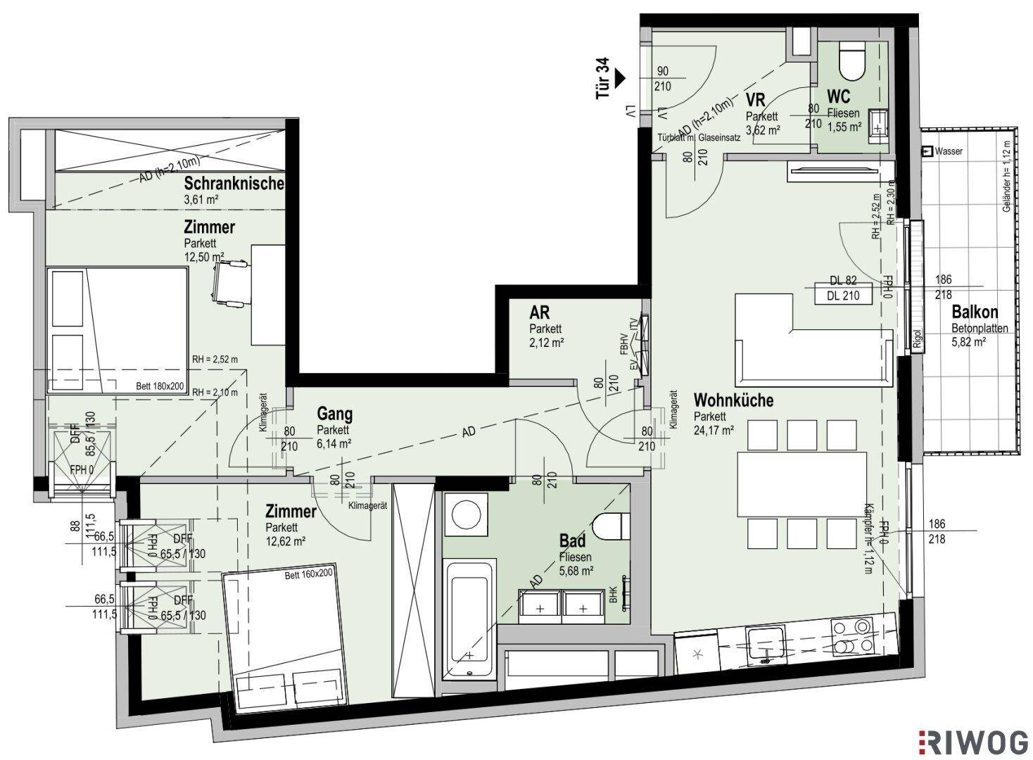 Detaillierter Grundriss einer Wohnung mit Wohnküche, zwei Zimmern und Balkon.