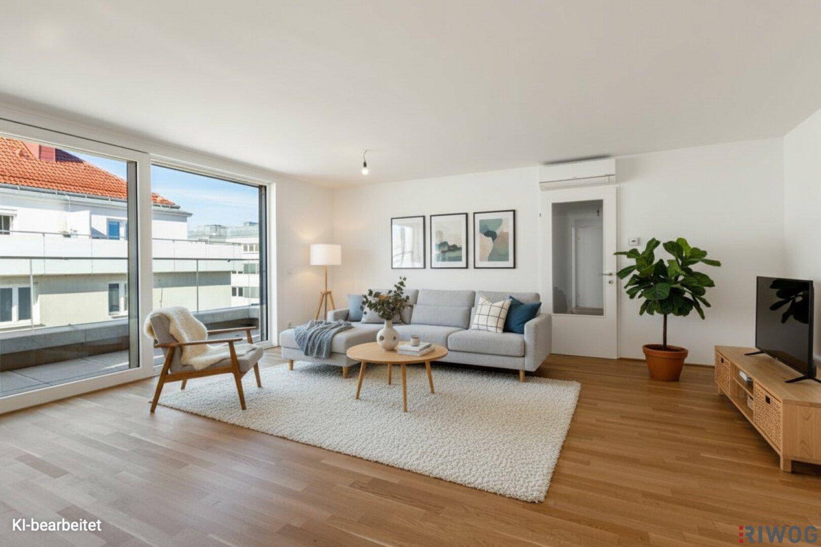 Modern eingerichtetes Wohnzimmer mit Parkettboden, bequemen Möbeln und Zugang zum Balkon.