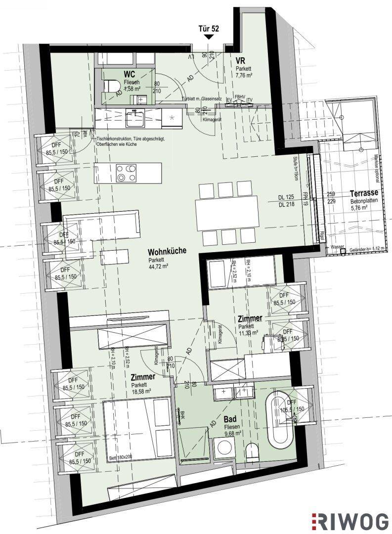Grundriss einer Wohnung mit Wohnküche, zwei Zimmern, Bad und Terrasse.