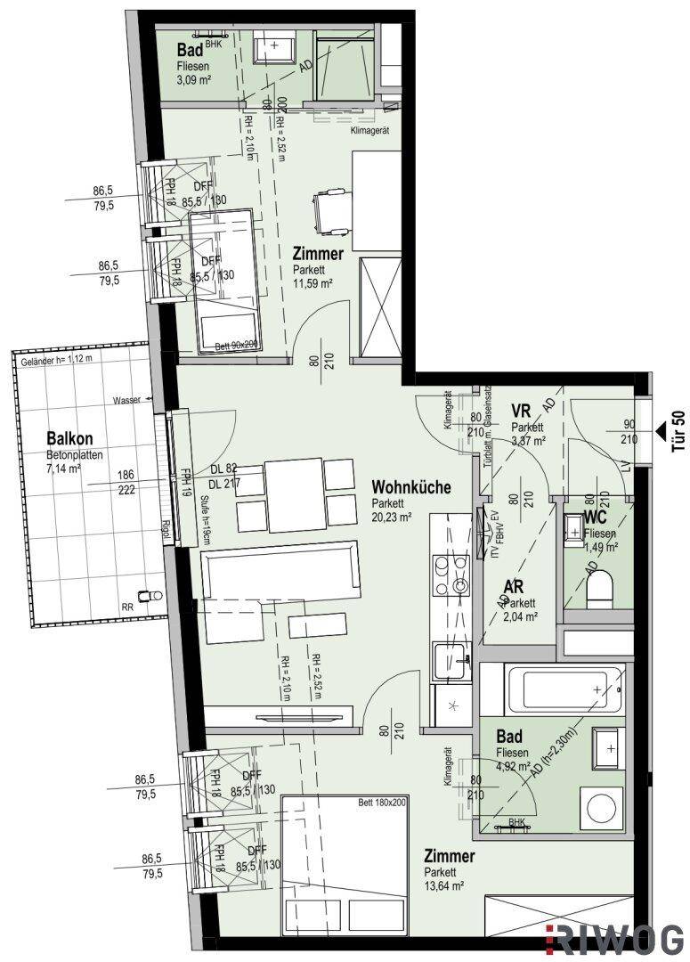 Grundriss einer Wohnung mit Balkon, Wohnküche, zwei Zimmern und zwei Bädern.