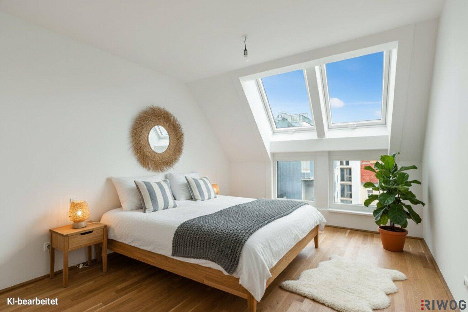Gemütliches Schlafzimmer mit Holzboden, Dachfenstern und modernem Dekor.