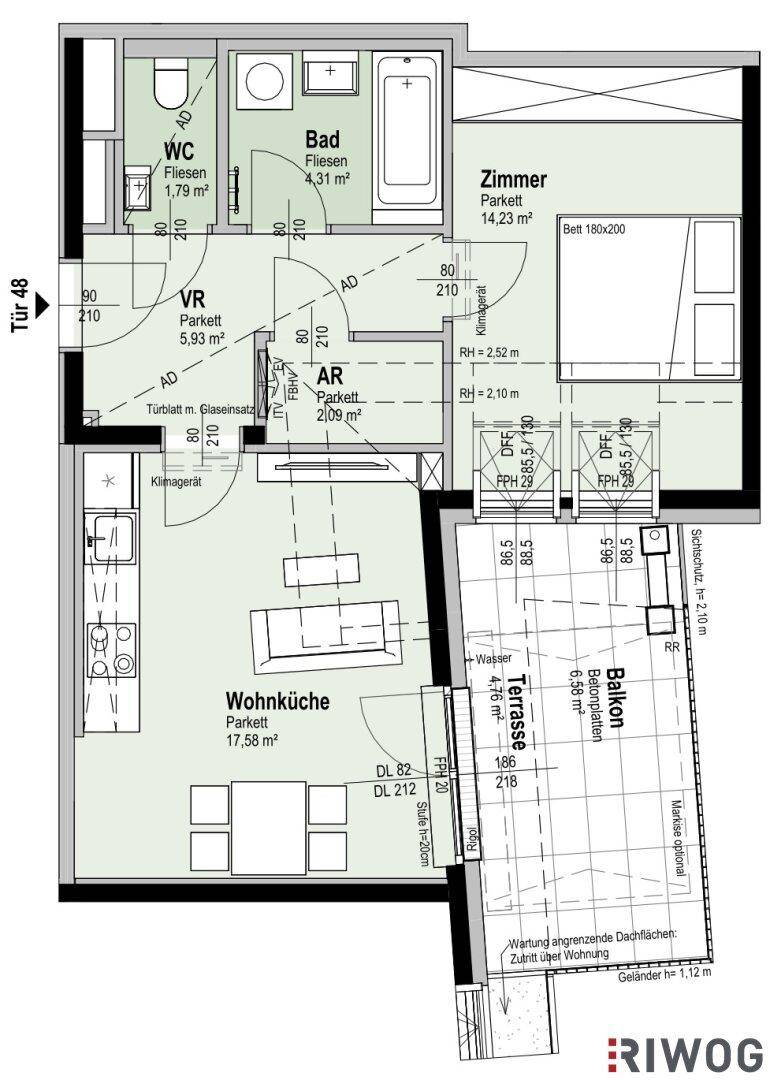 Grundriss einer Wohnung mit Wohnküche, Schlafzimmer, Bad und Terrasse.