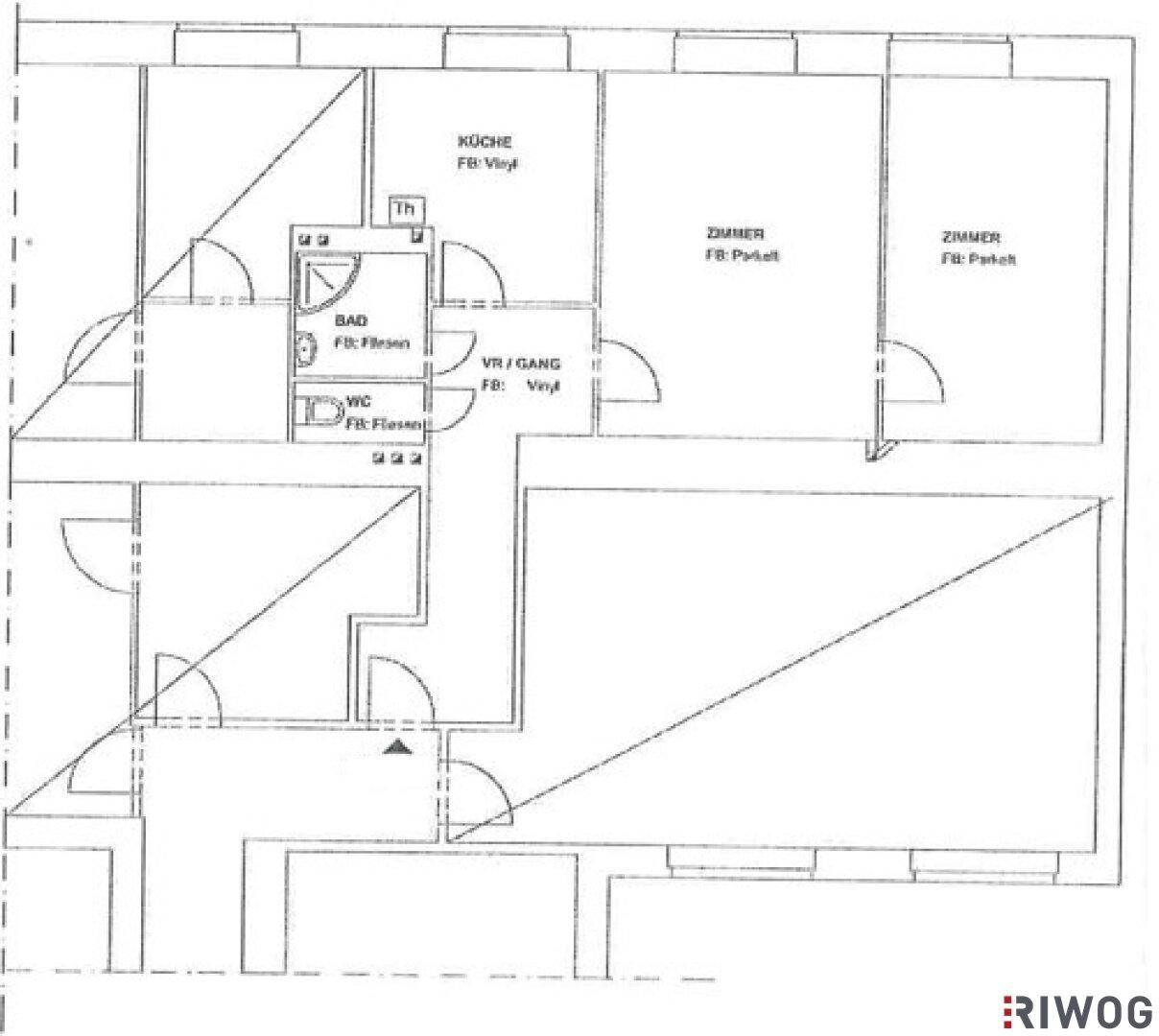 Grundriss einer Wohnung mit Küche, Bad, WC und mehreren Zimmern.