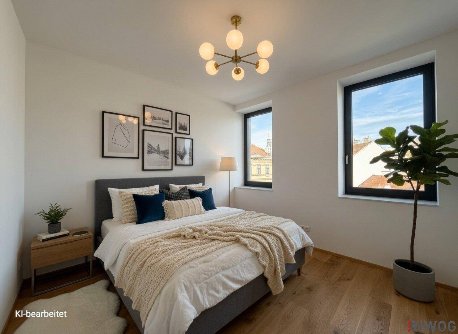 Gemütliches Schlafzimmer mit Doppelbett, Holzboden und moderner Deckenleuchte, die für eine angenehme Atmosphäre sorgt.