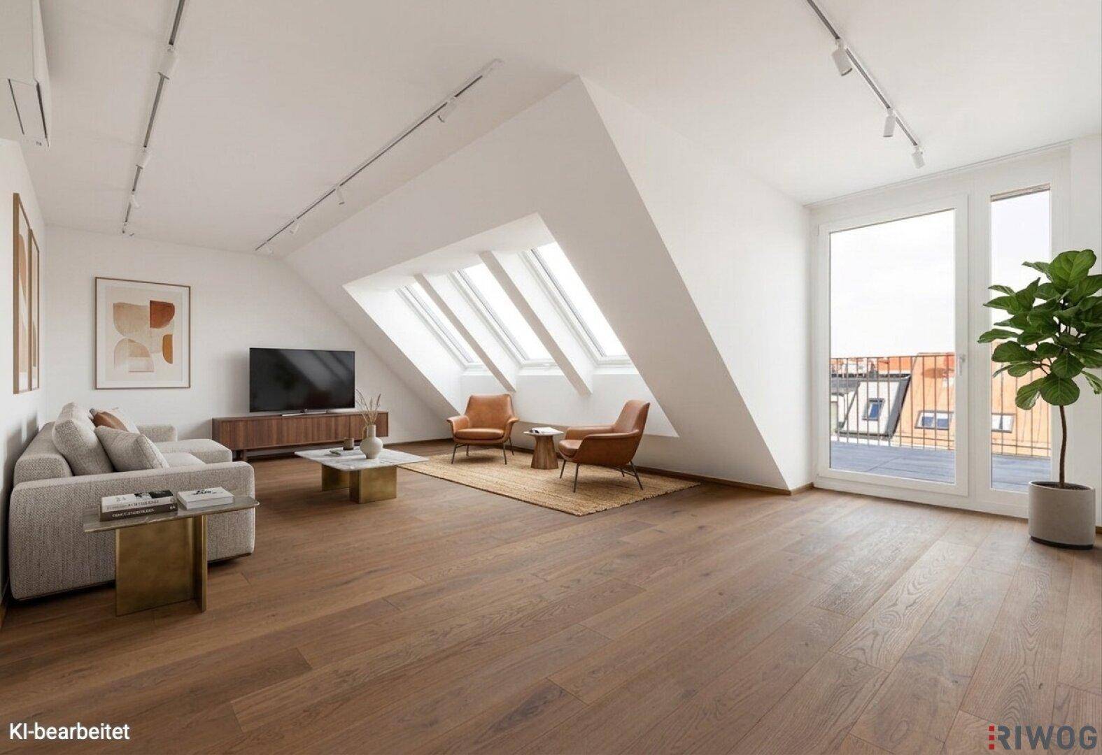 Helles Wohnzimmer im Dachgeschoss mit hohen Decken, Holzboden und großen Dachfenstern.
