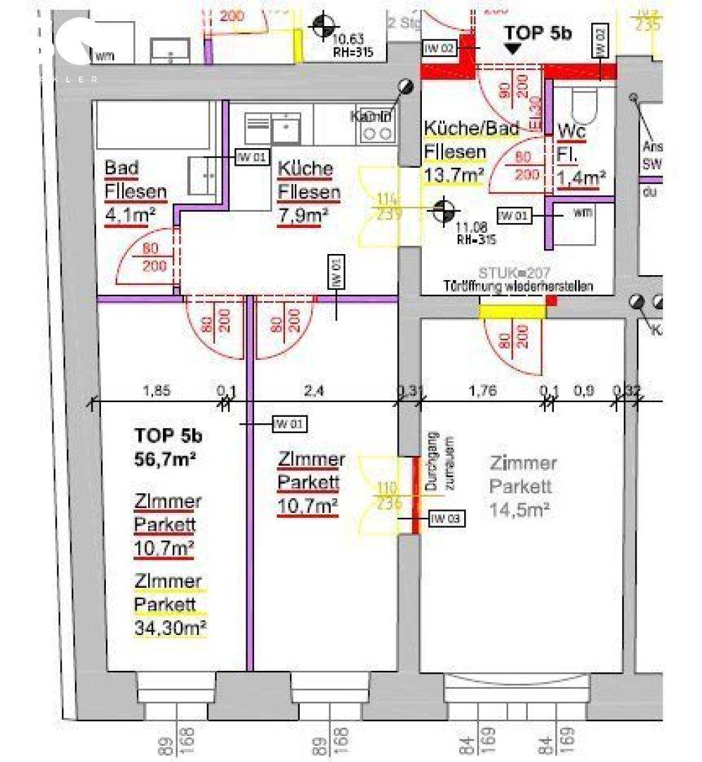 Detaillierter Grundriss der Wohnung Top 5b mit Zimmern und Bädern.