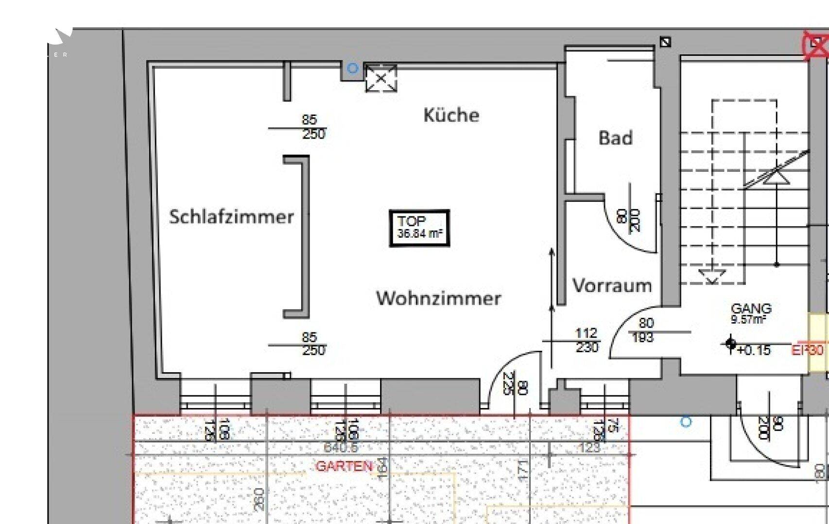 Grundriss einer Wohnung mit Schlafzimmer, Wohnzimmer, Küche und Bad.