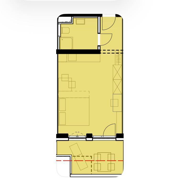Grundriss einer kompakten Wohnung mit Schlafzimmer, Badezimmer und Balkon.