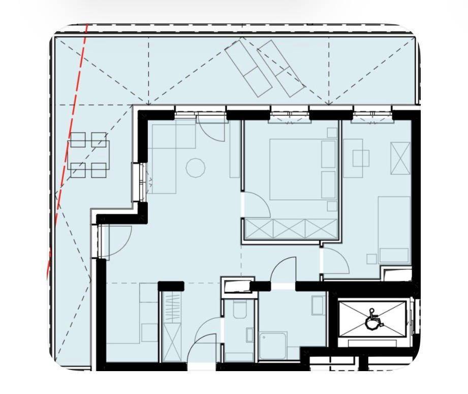 Grundriss einer Wohnung mit Terrasse, Schlafzimmern und barrierefreiem Zugang.