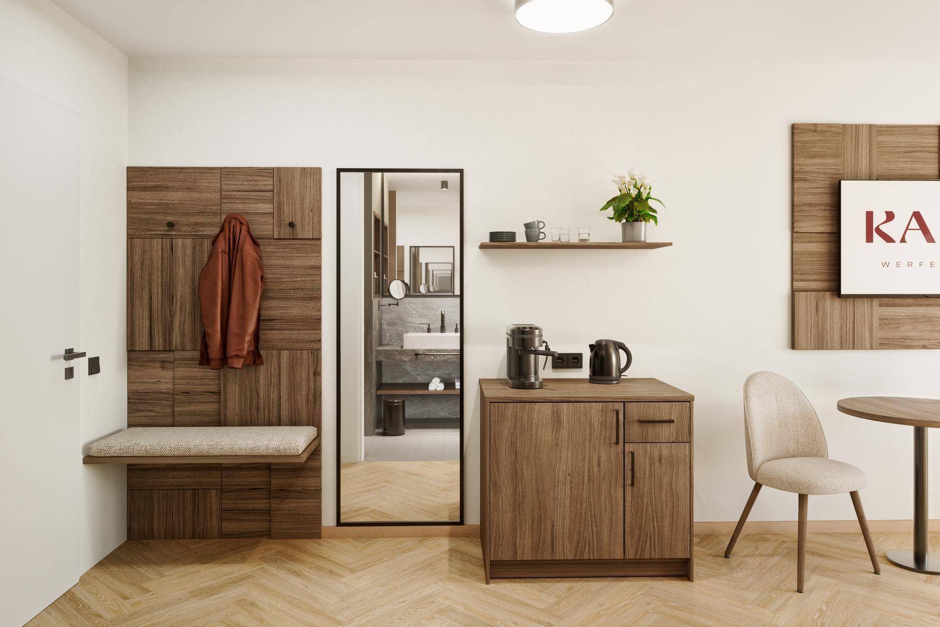 Moderner Eingangsbereich mit Garderobe, kleiner Kaffeestation und Blick ins Badezimmer.